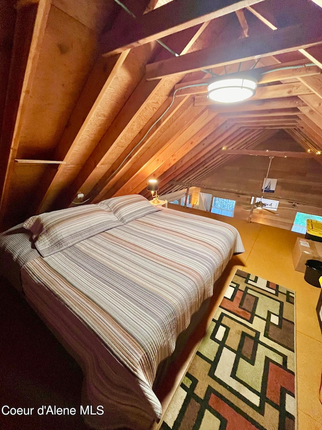 bedroom featuring vaulted ceiling