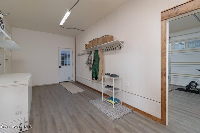 mudroom featuring wood-type flooring