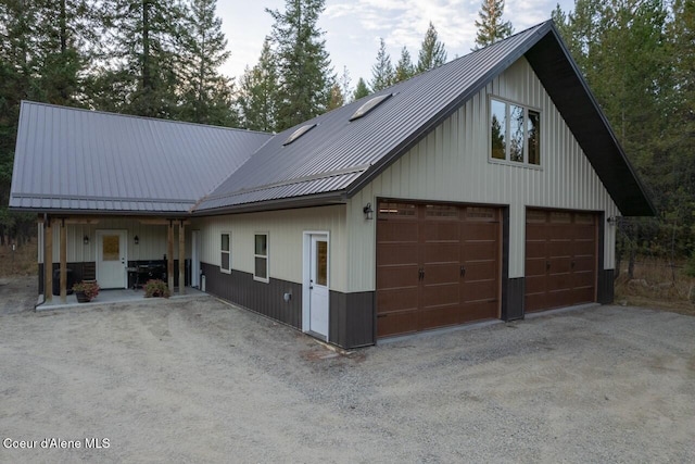 110 Sheri Dr, Moyie Springs, ID 83845 - view of front of home featuring a metal roof and a garage