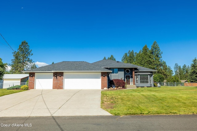 ranch-style home with a garage and a front yard