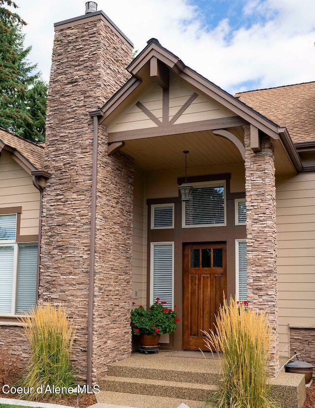 doorway to property featuring a porch