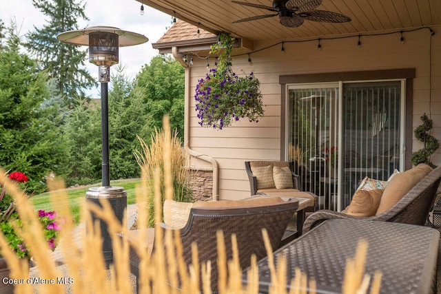 view of patio with ceiling fan and an outdoor hangout area