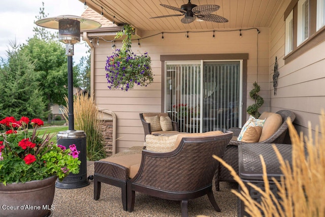 view of patio / terrace with an outdoor living space and ceiling fan