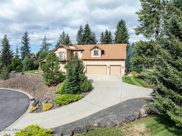 view of front of home with a garage