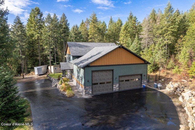 exterior space featuring an outdoor structure and a garage