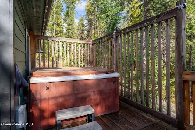 deck with a hot tub