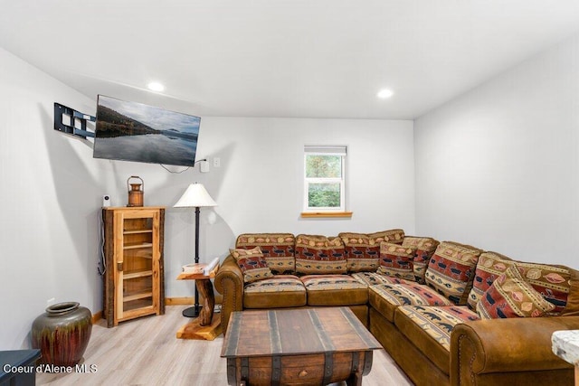 living room with light hardwood / wood-style flooring