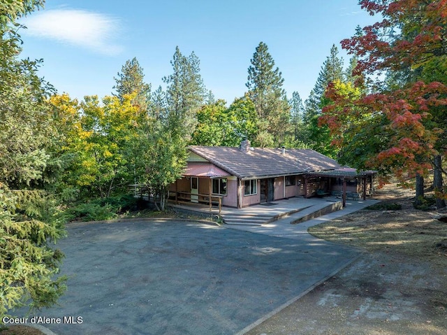 905 S Tanglewood Rd, Post Falls, ID 83854 - view of front facade with covered porch and driveway