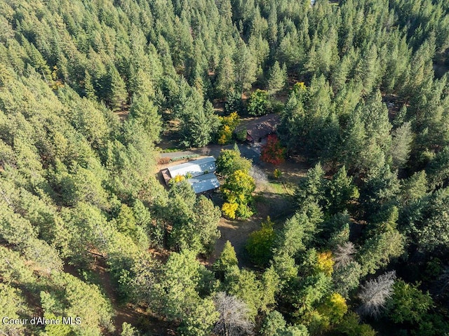 905 S Tanglewood Rd, Post Falls, ID 83854 - aerial view of property and surrounding area featuring a heavily wooded area
