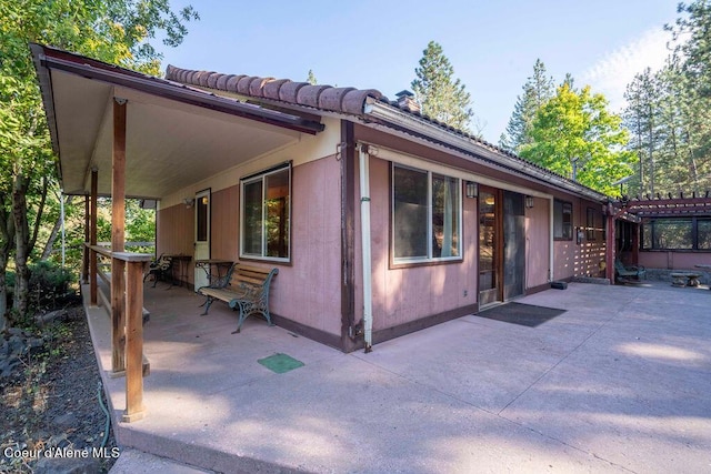 905 S Tanglewood Rd, Post Falls, ID 83854 - view of side of home with a patio