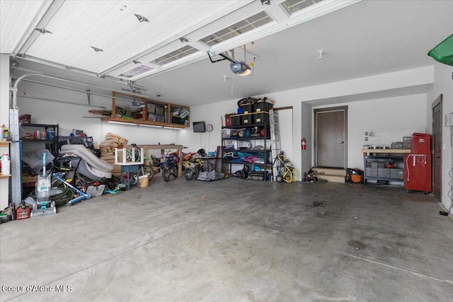 garage featuring a garage door opener