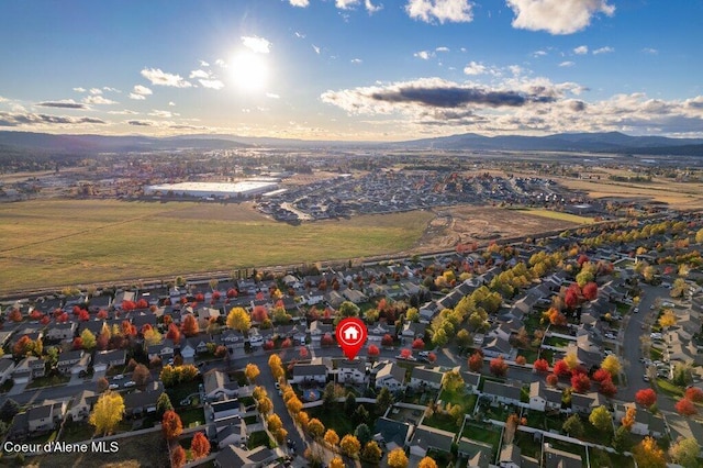 aerial view at dusk with a mountain view