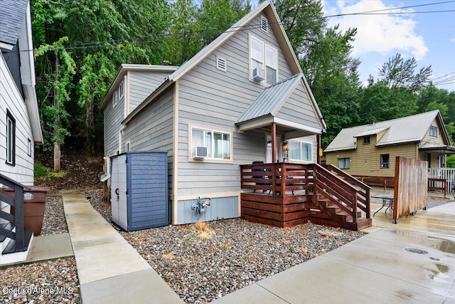 view of front of property featuring cooling unit