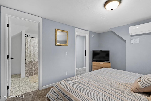 carpeted bedroom featuring a wall mounted air conditioner