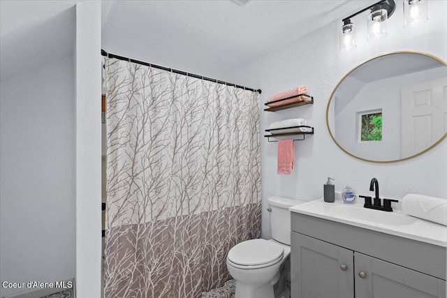 bathroom with vanity, toilet, walk in shower, and tile walls