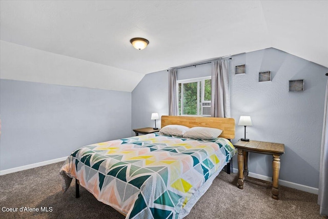 bedroom with carpet and vaulted ceiling