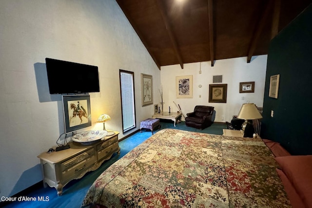 bedroom with beamed ceiling and high vaulted ceiling