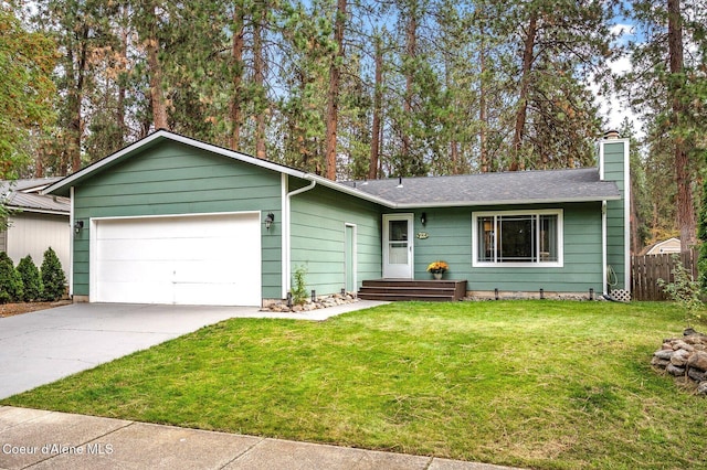 ranch-style home featuring a front lawn and a garage