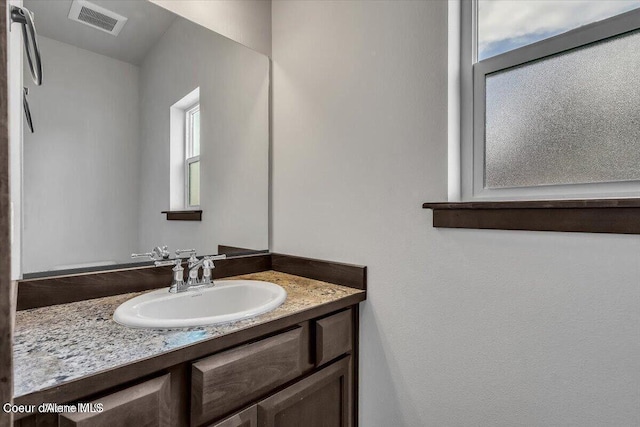 2711 E Cinder Ave, Post Falls, ID 83854 - bathroom featuring plenty of natural light and vanity