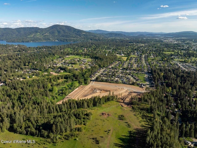 11996 N Rocking R, Hayden, ID 83835 - aerial view of property and surrounding area with a heavily wooded area and a water and mountain view