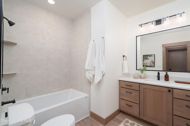11996 N Rocking R, Hayden, ID 83835 - full bathroom featuring vanity, wood finished floors, and shower / bath combination