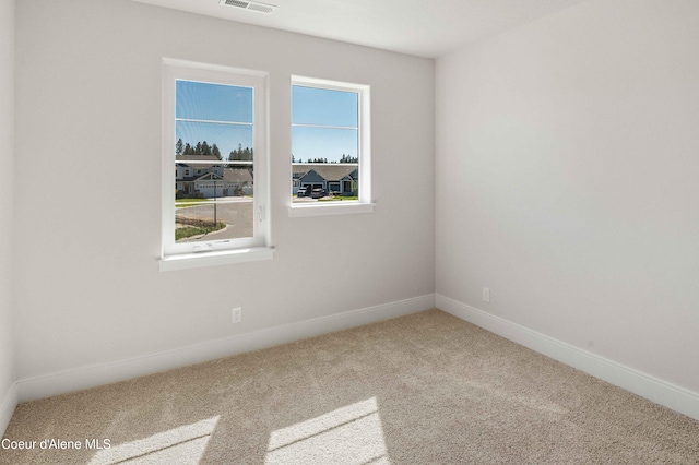 view of carpeted spare room