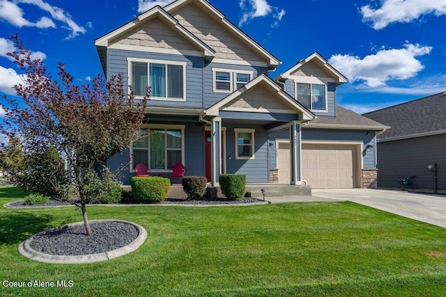 craftsman inspired home with a front lawn and a garage