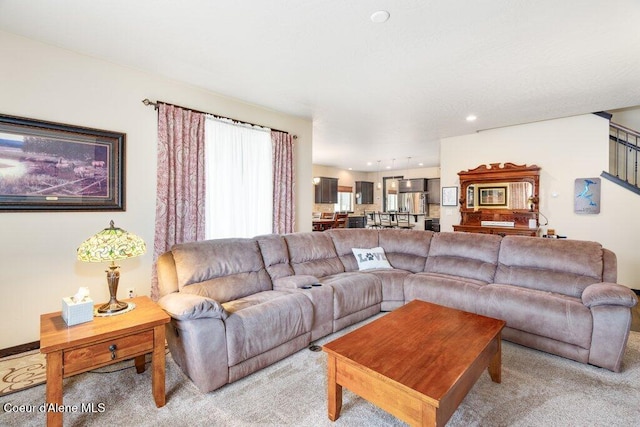 living room featuring light colored carpet