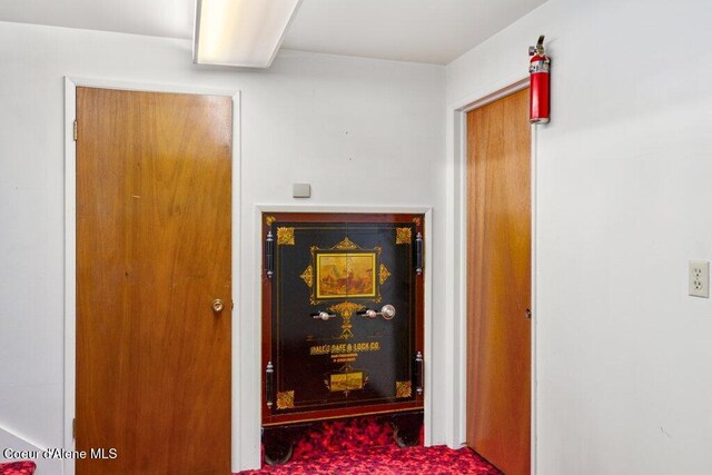 hallway with carpet