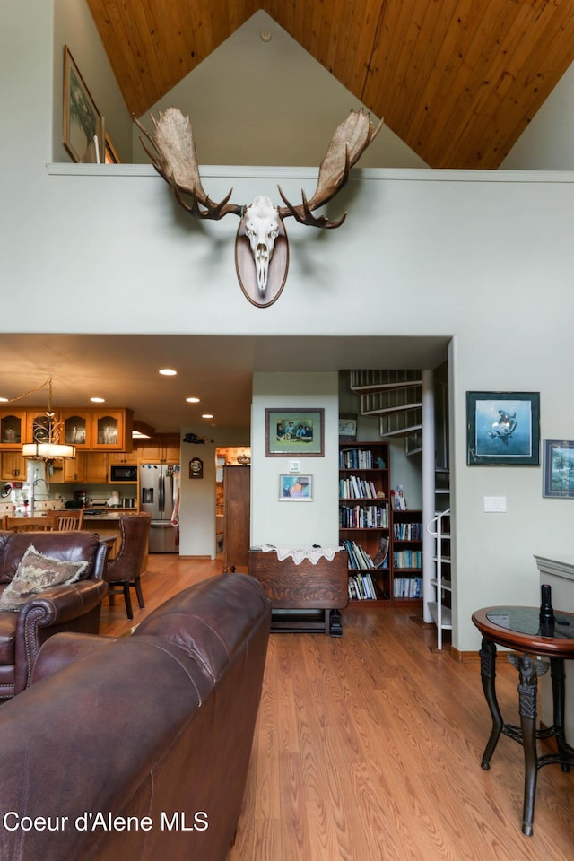 296 Ullr Dr, Sandpoint, ID 83864 - living area featuring recessed lighting, high vaulted ceiling, and light wood-type flooring