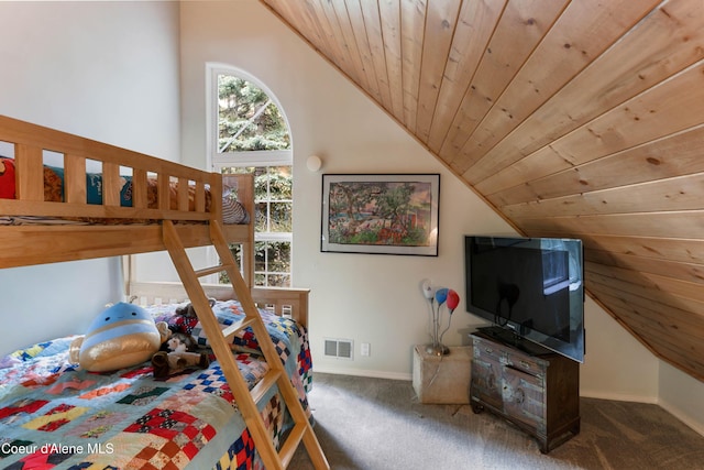 296 Ullr Dr, Sandpoint, ID 83864 - carpeted bedroom featuring visible vents, wood ceiling, baseboards, and vaulted ceiling