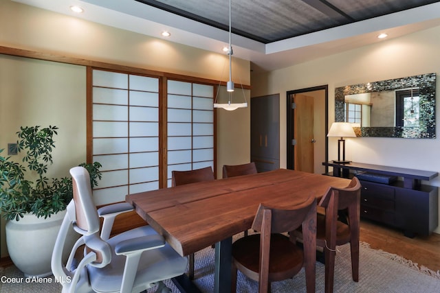 dining area featuring wood-type flooring