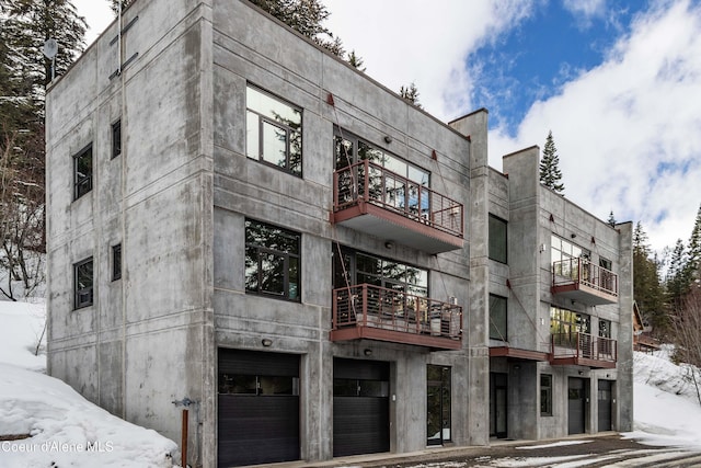 view of building exterior with an attached garage