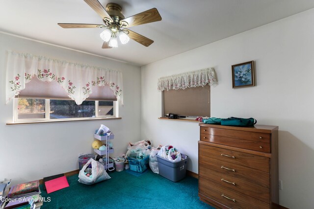 game room featuring carpet and ceiling fan