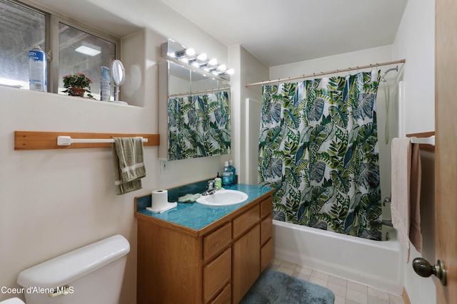 full bathroom with vanity, toilet, and shower / bath combination with curtain