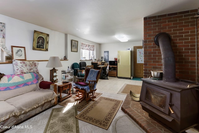 living room featuring a wood stove