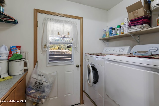 laundry area with washer and clothes dryer