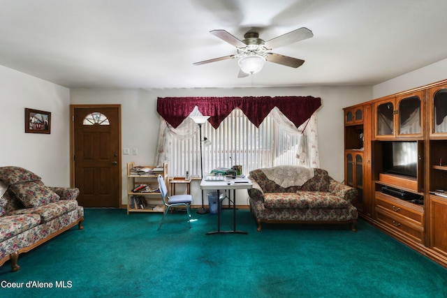 carpeted living room featuring ceiling fan