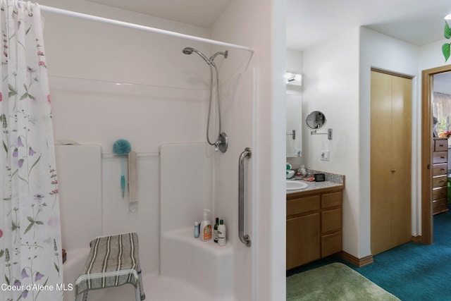 bathroom with vanity and a shower with curtain