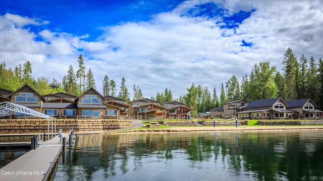 view of water feature with a dock