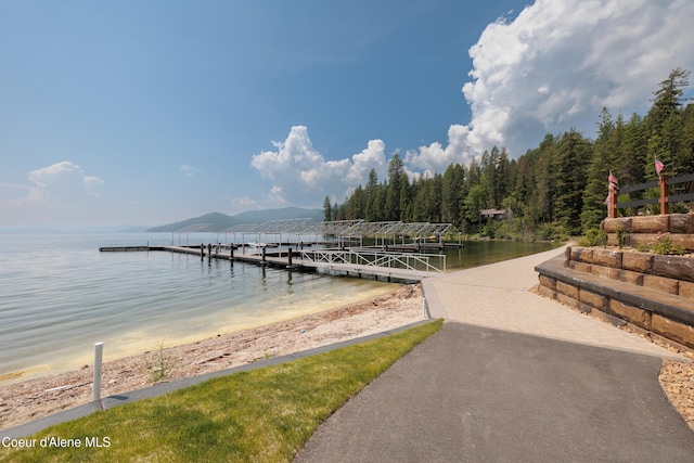 dock area featuring a water view