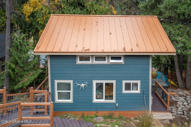 exterior space with a wooden deck