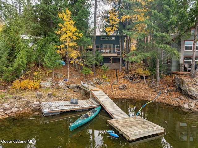 view of dock with a water view