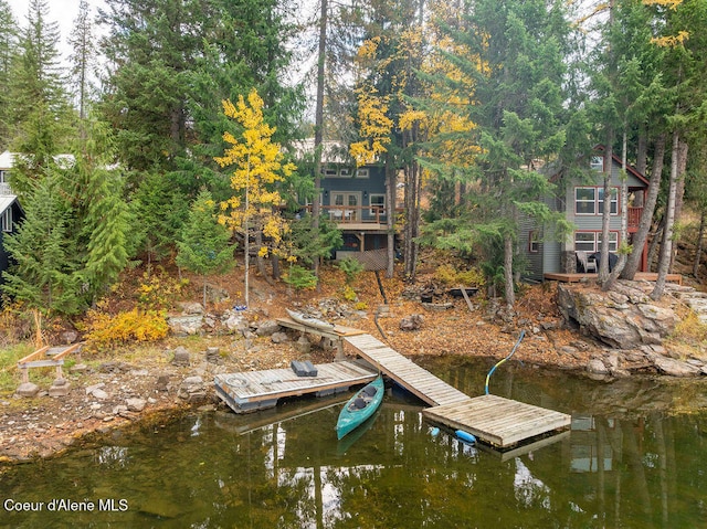 dock area featuring a water view