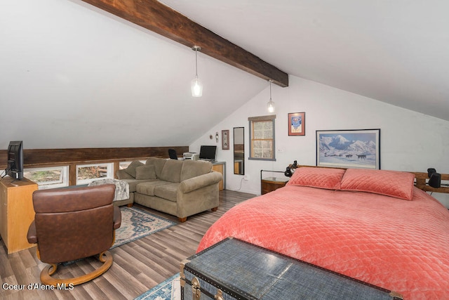 bedroom with hardwood / wood-style flooring and lofted ceiling with beams