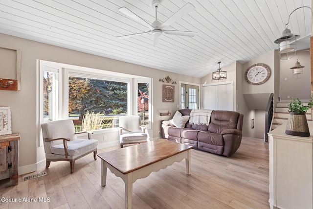 living room featuring vaulted ceiling, light hardwood / wood-style flooring, ceiling fan with notable chandelier, and wooden ceiling