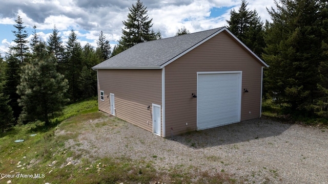 view of outbuilding featuring a garage