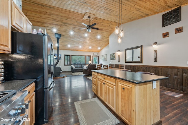 kitchen featuring wood walls, light brown cabinets, wood ceiling, dark hardwood / wood-style floors, and ceiling fan