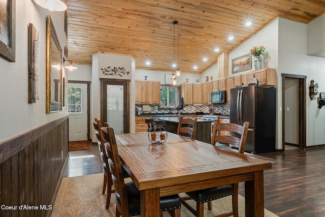 dining area with wood ceiling, high vaulted ceiling, and dark wood-type flooring