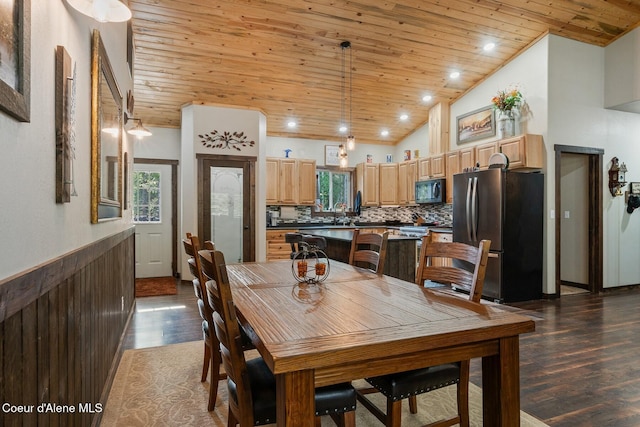 648 Curley Creek Rd, Moyie Springs, ID 83845 - dining space with wood ceiling, dark wood-type flooring, vaulted ceiling, a wainscoted wall, and recessed lighting